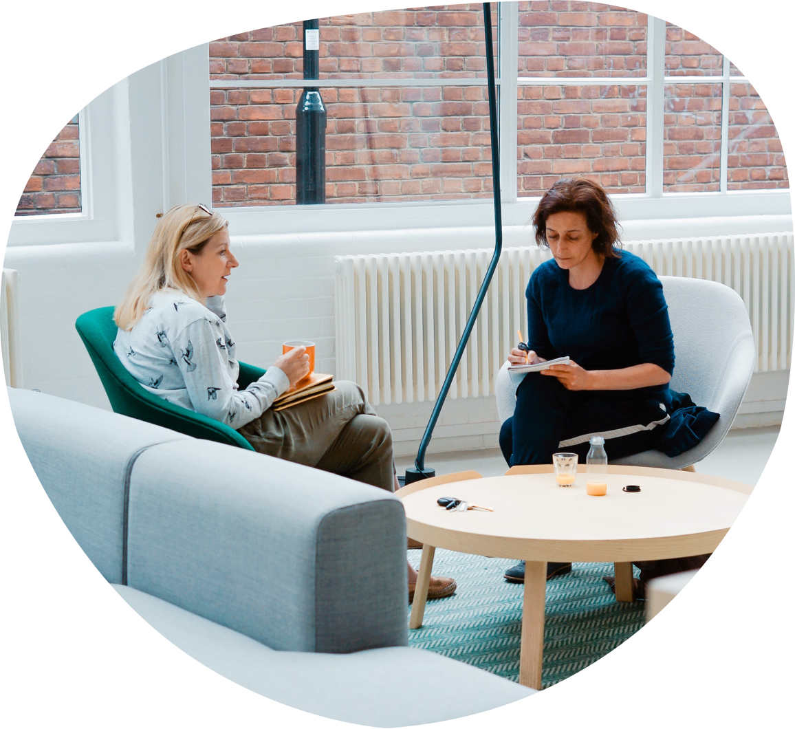 A work place discussion between two women